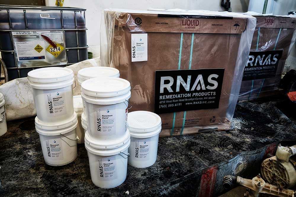 RNAS bioremediation products in pails onsite